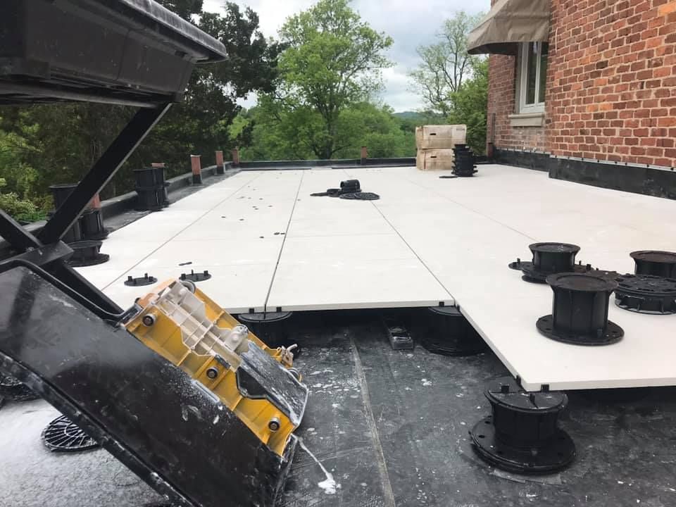 Commercial Roofers Install Roof Pavers