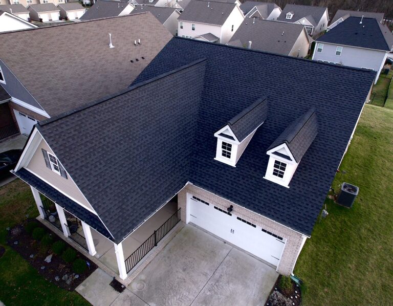 Aerial view of new asphalt shingle roof.