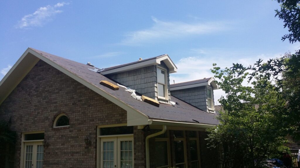 A house undergoing roof repairs in Mt. Juliet