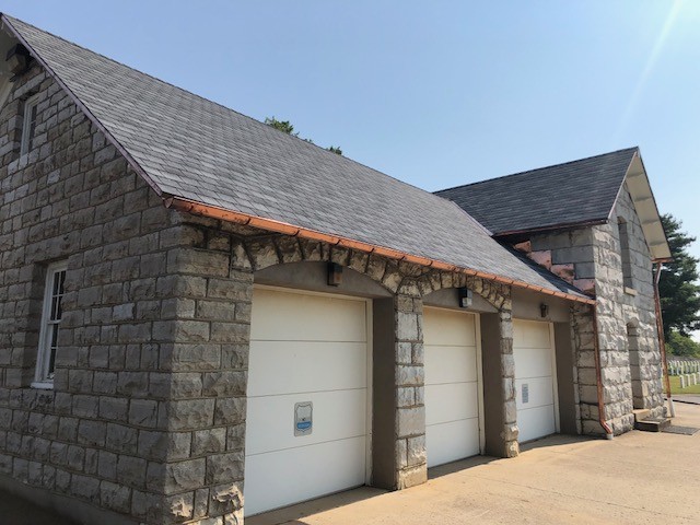 asphalt-shingles-stone-structure - MidSouth Construction LLC GAF slate-line designer asphalt shingles on a historical stone structure