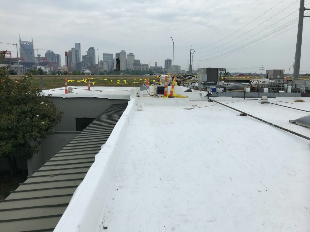 tpo-commercial-flat -roof - MidSouth Construction LLC A white TPO commercial Sure-Weld flat roof